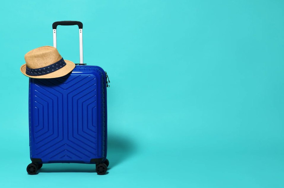 Suitcase in front of Blue Background
